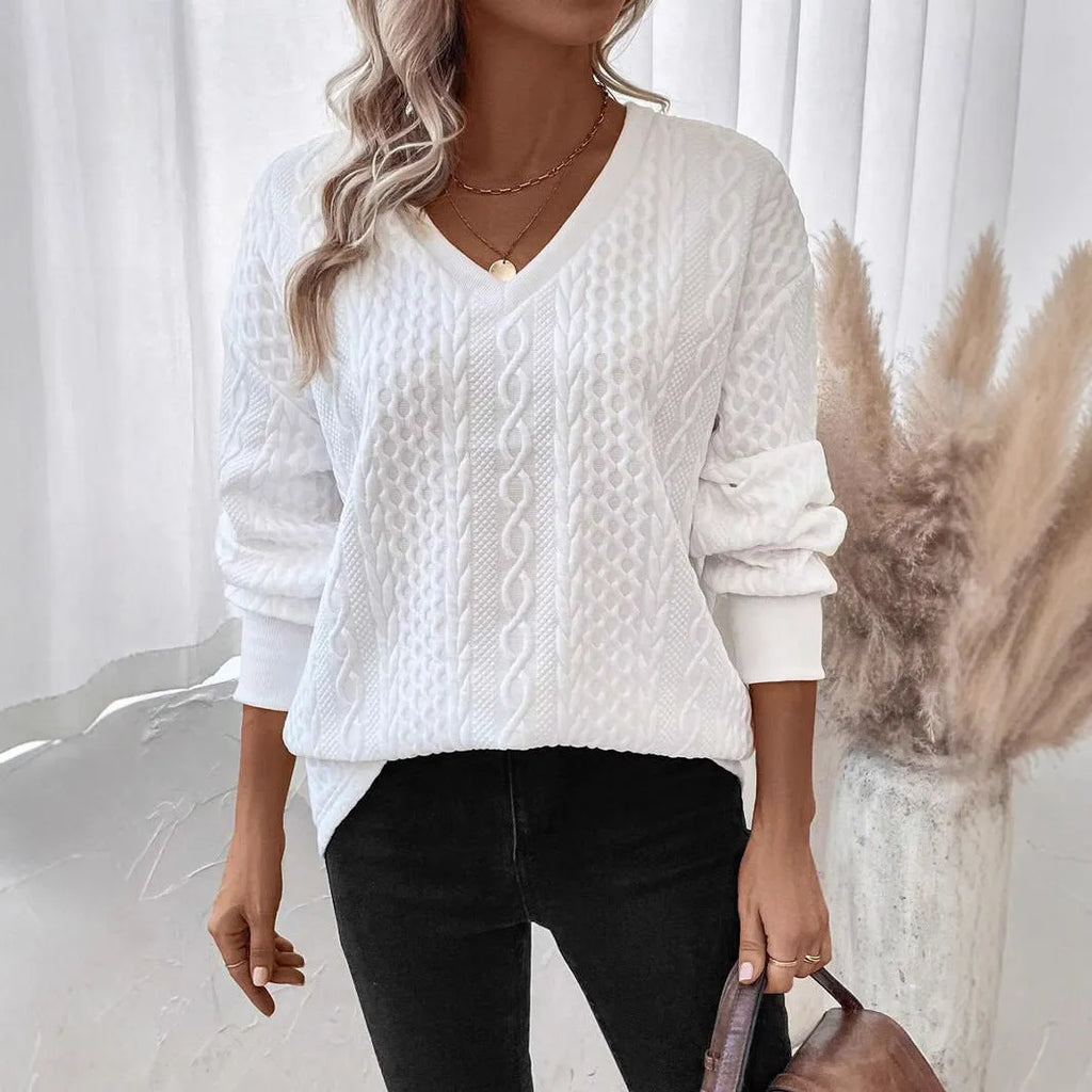 Milky white loose fit men's long sleeve T-shirt with a raised 3D pattern, casual style.