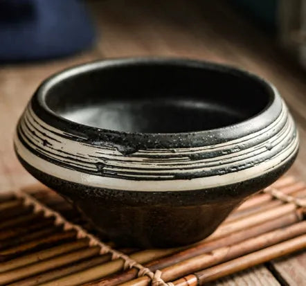 Porcelain Japanese soup bowl in stone conch shape with underglaze finish