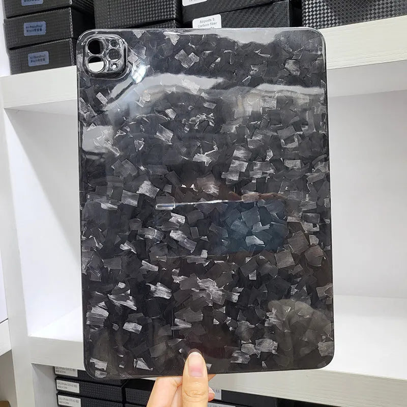 Genuine carbon fibre hard protective case for Apple iPad Pro 11 tablet in matte and forged finishes.