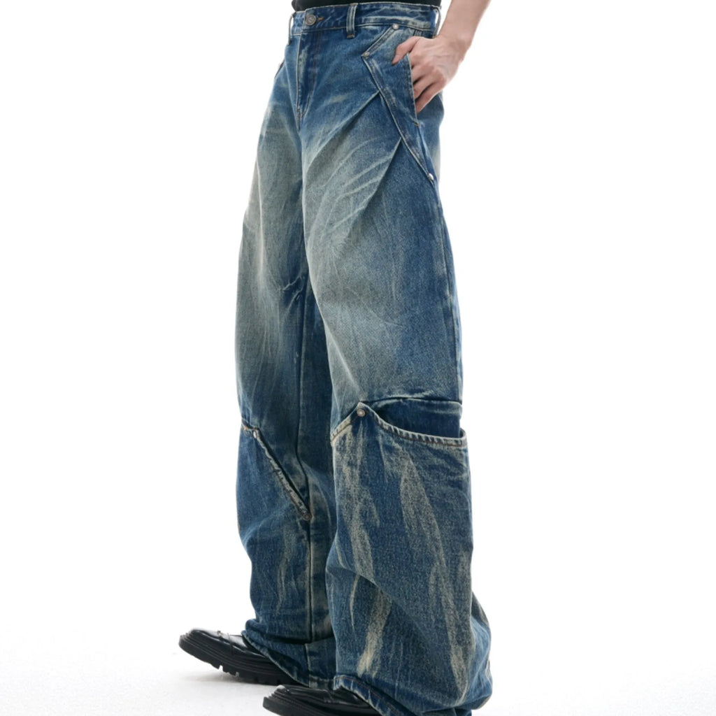 Men's verdant blue loose fit curved knife jeans with retro wash and burst pattern detail