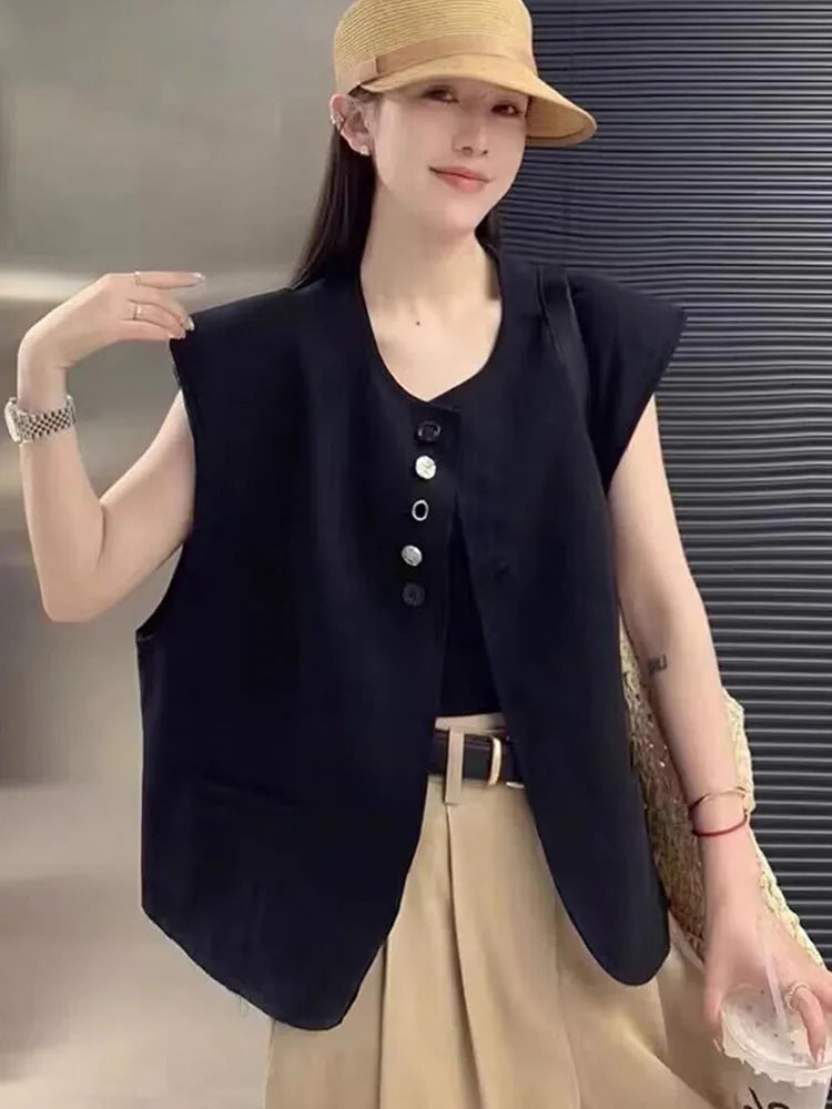 Women's loose-fit polyester vest in milky white, featuring pockets and a short 40cm length.