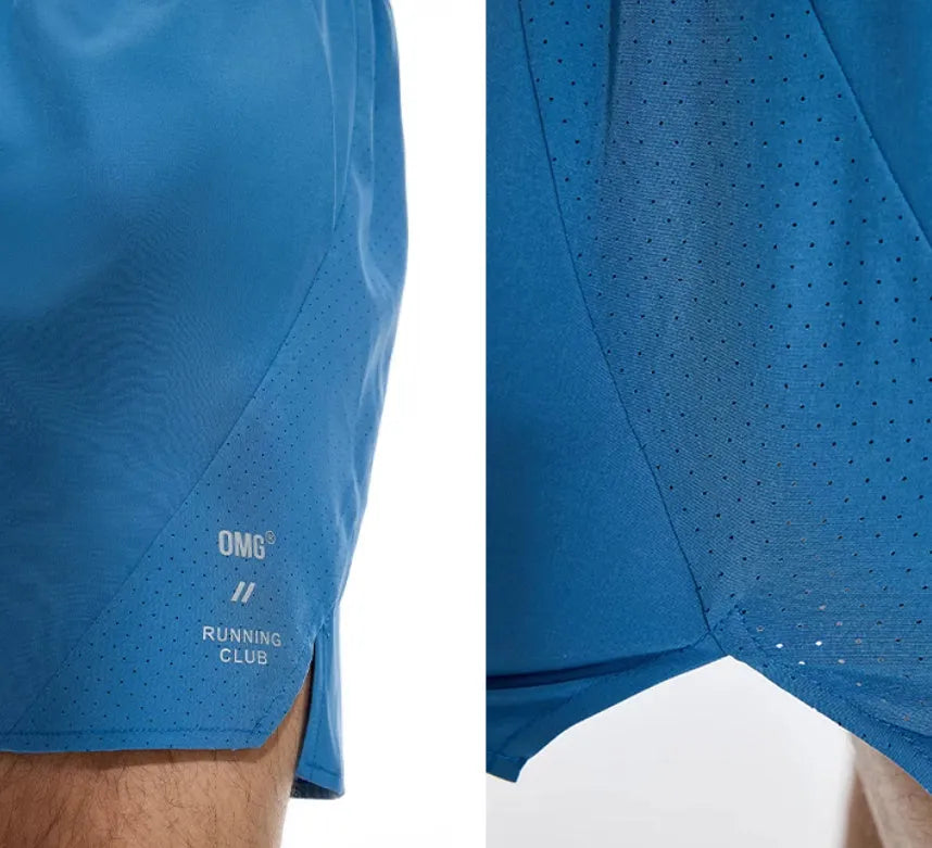 Black and blue four-point stretch running shorts with laser-cut stitching detail on a mannequin.