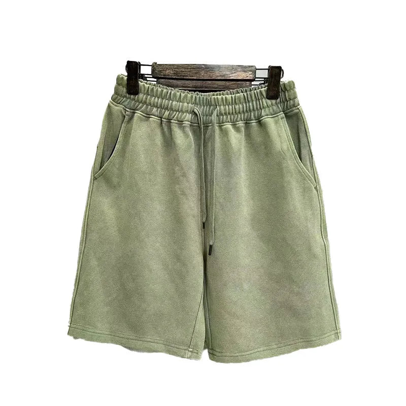 Men's cotton distressed shorts in loose fit straight-leg design