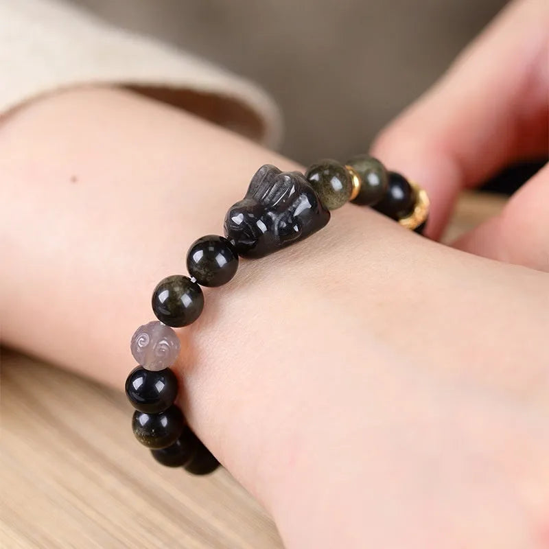 Handmade obsidian bracelet with lying rabbit silver charm and grey agate beads in 8mm and 10mm sizes