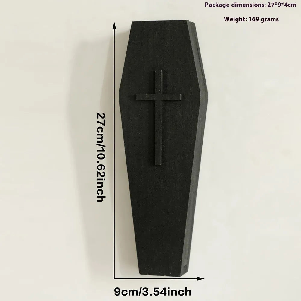 Black wooden cross-shaped wall shelf decoration measuring 27cm by 9cm