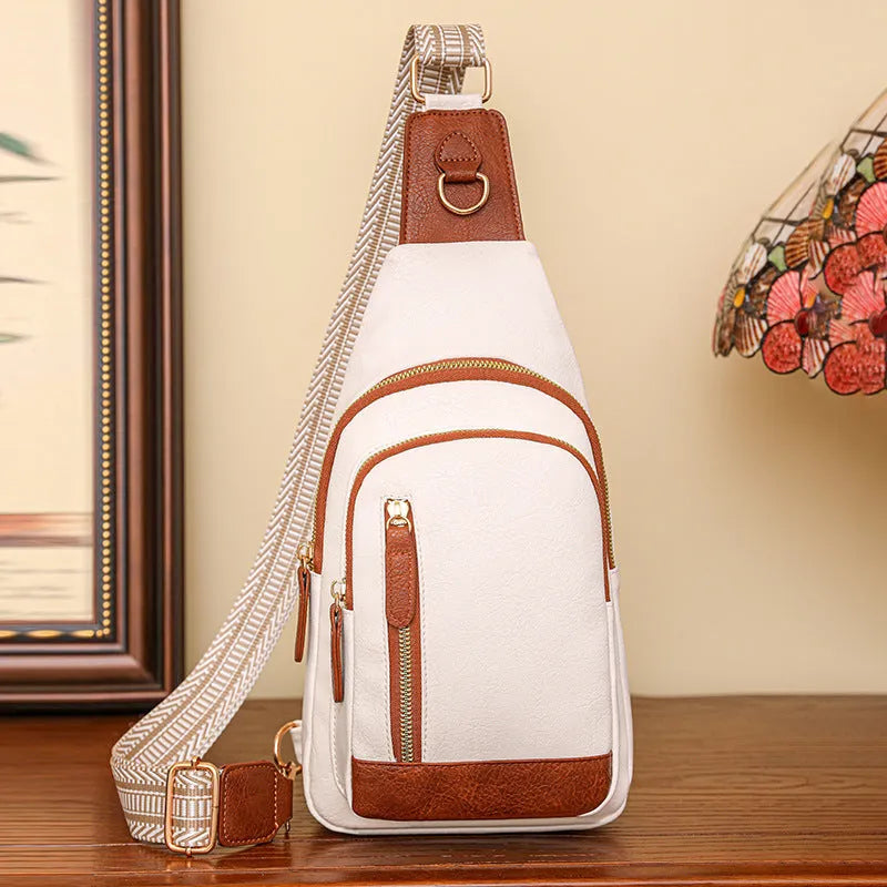 Women's soft PU leather crossbody bag in street trend style with open pocket and internal compartments