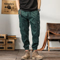 Men's loose cotton harem style trousers with tapered ankle banding in khaki colour