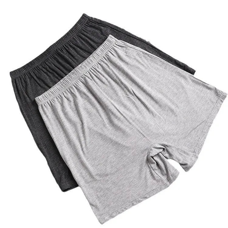 Men's solid colour high-waist boxer shorts made from modal fabric, shown in black, on a white background.