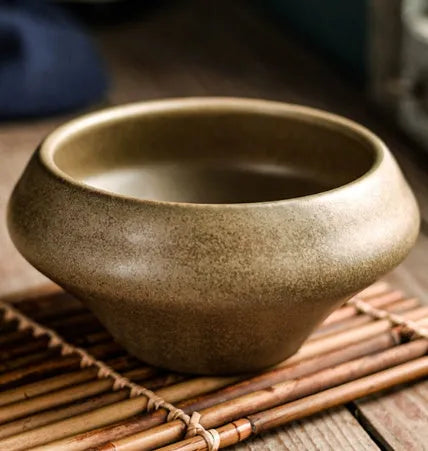 Porcelain Japanese soup bowl in stone conch shape with underglaze finish