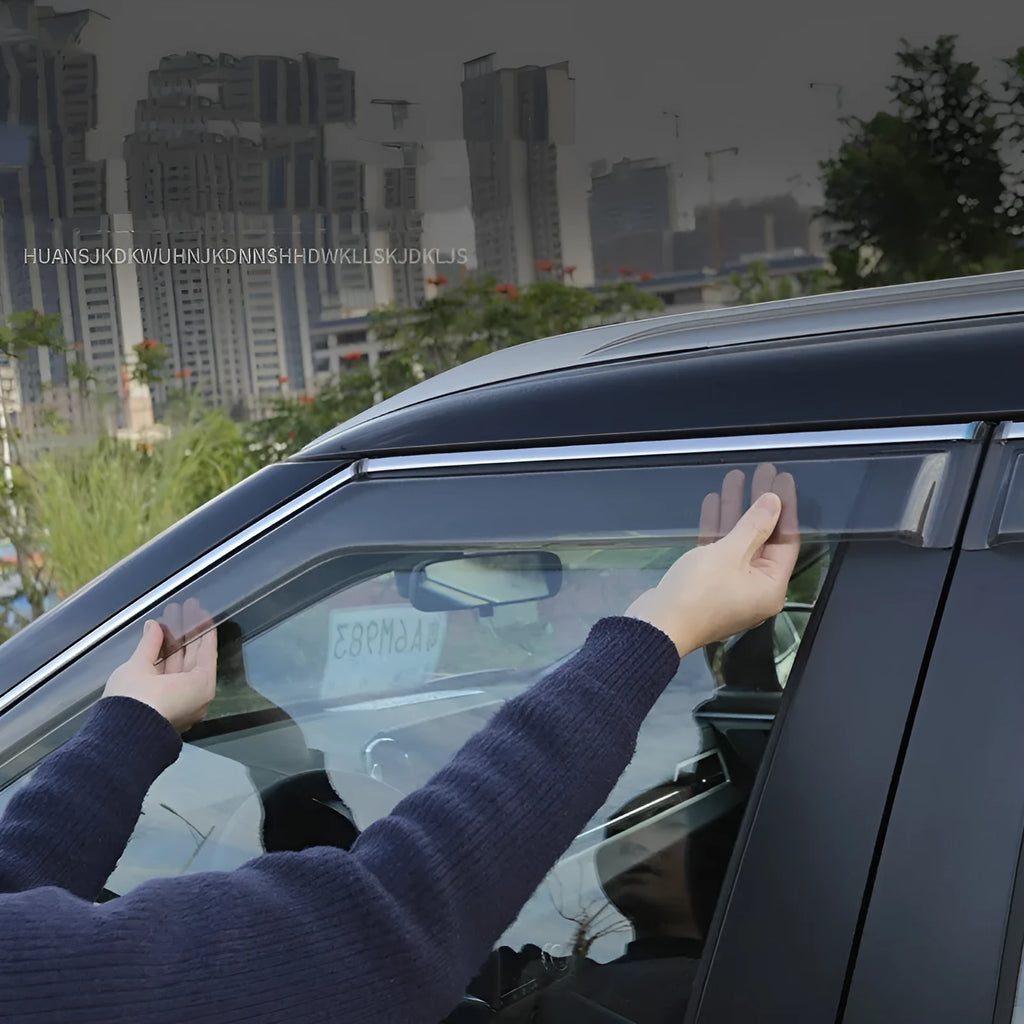 2023 Outlander window deflectors in black warrior style, mounted on vehicle exterior