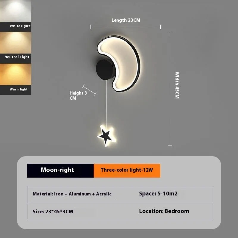 Children's bedside wall lamp with cloud and star design in black finish showing three-colour LED illumination