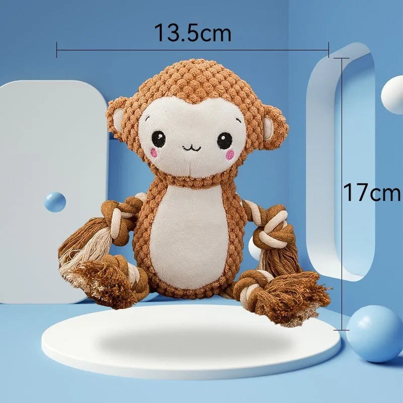 Lion and monkey soft plush squeaky dog toys side by side.
