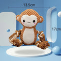 Lion and monkey soft plush squeaky dog toys side by side.