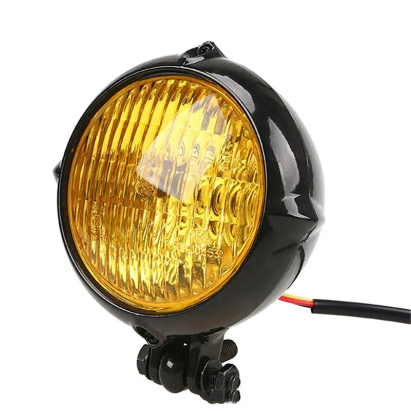 Black aluminium Harley retro headlight with 8cm diameter and yellow halogen bulb