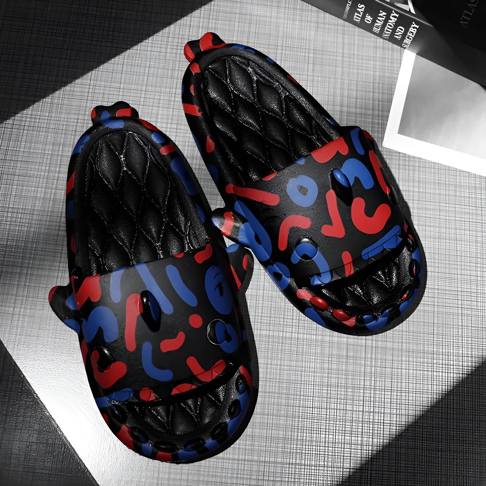 Cute shark design on light beige EVA open-toe home slippers for indoor wear.