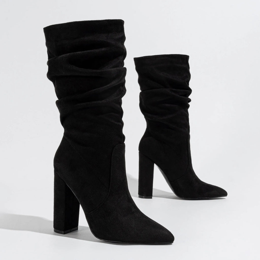 Women's black suede pointed-toe boots with chunky heel and mid-calf shaft height