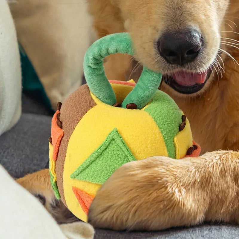 Green plush ball dog toy with multiple treat pockets and squeaker for small to medium dogs