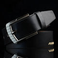Men's retro style casual belt with pin buckle and pattern detail on imitation leather strap.