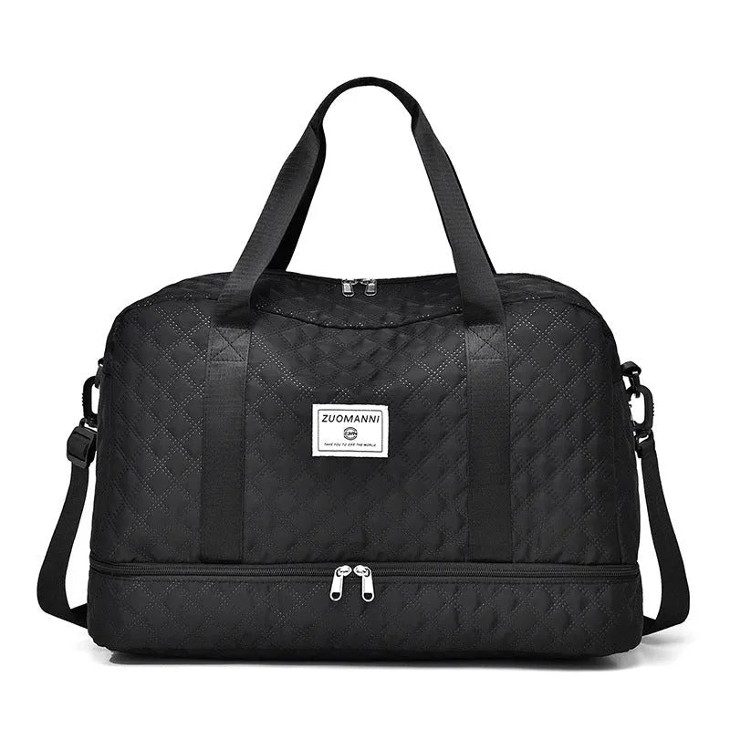 Large Oxford cloth travel bag with 36-55 litre capacity shown in haze blue colour