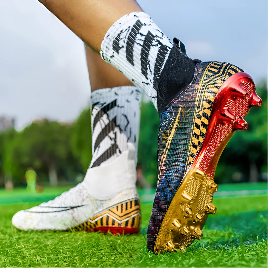 Men's high-top football shoes with gold plated sole in white, black, and mandarin duck colours.
