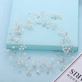 Wedding hair band with crystal and pearl decorative elements in gold, silver and rose gold colour options