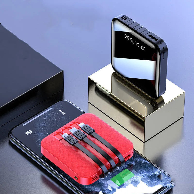 Square black or red power bank with a built-in charging cable protruding from the case.
