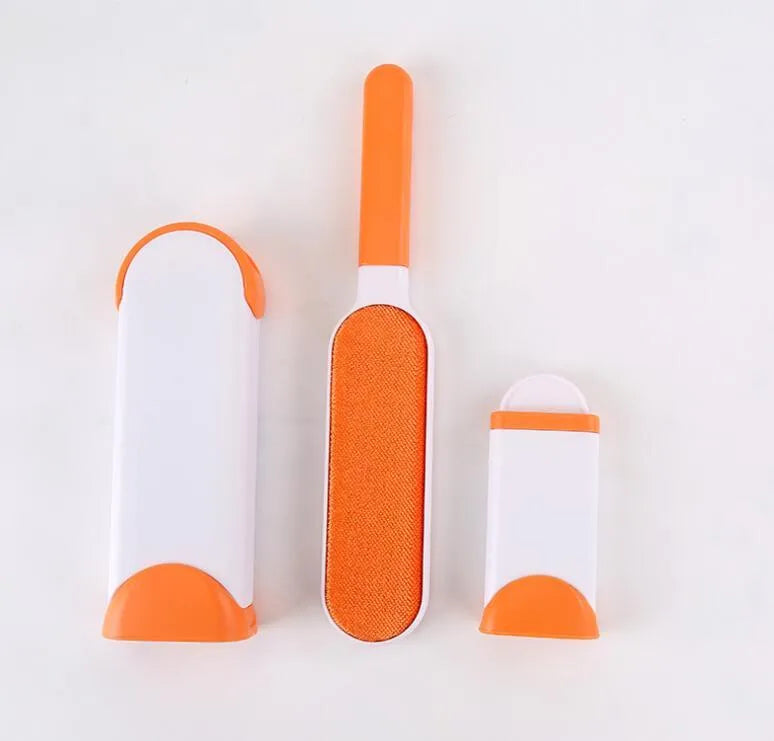 Blue reusable pet hair removal comb with double-sided brush and self-cleaning base for furniture.