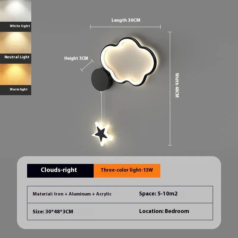 Children's bedside wall lamp with cloud and star design in black finish showing three-colour LED illumination