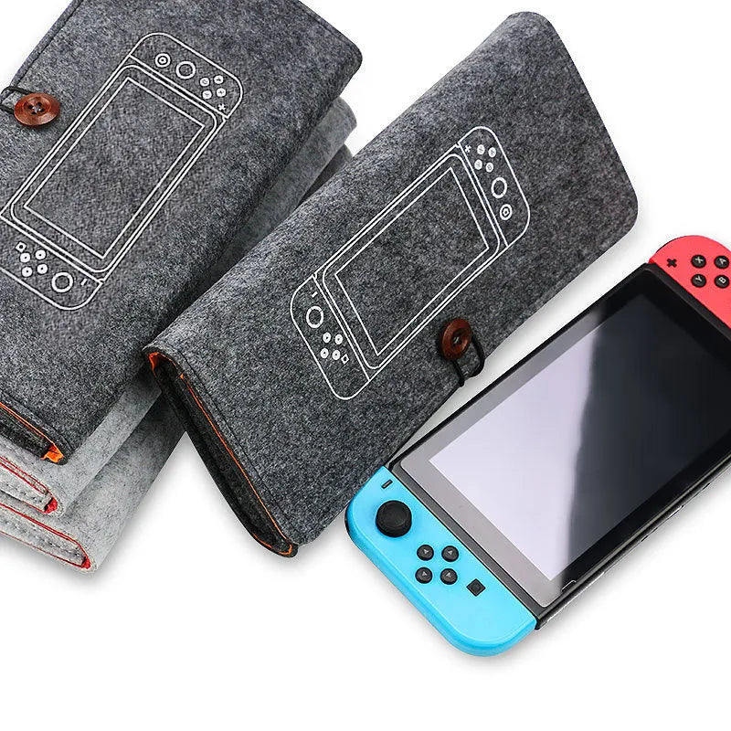 Black Nintendo Switch felt pouch showing game card slots and double storage compartments