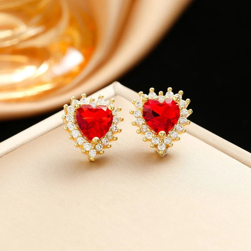 Gold red titanium steel necklace with hearts flower pendant and mixed gemstone inlay, matching ring and earrings.