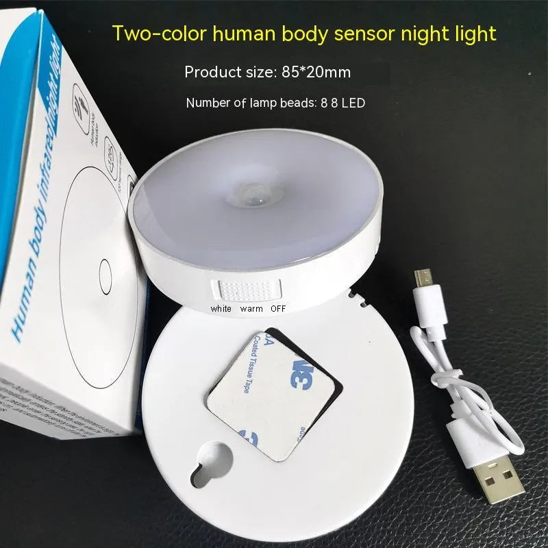 Small white USB rechargeable motion sensor LED night light with adhesive backing