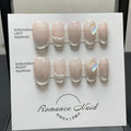 Women's handmade manicure gel nails in blush armour style with short ladder design