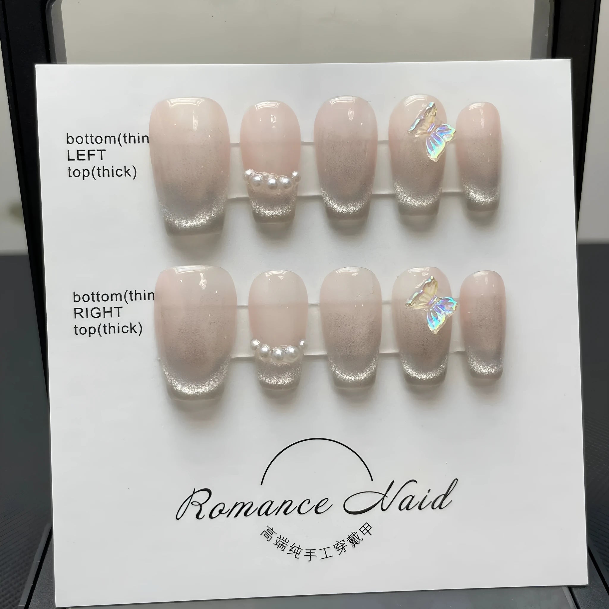 Women's handmade manicure gel nails in blush armour style with short ladder design