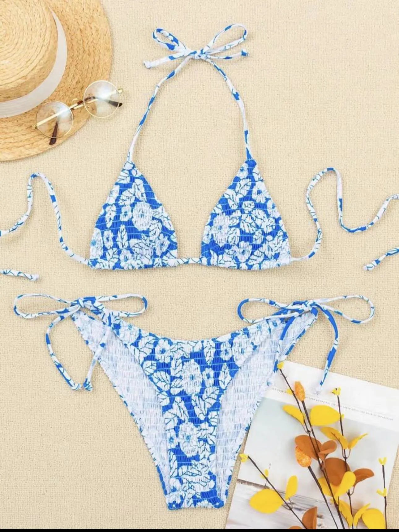 Women's halter neck swimsuit with floral briefs in light blue colour