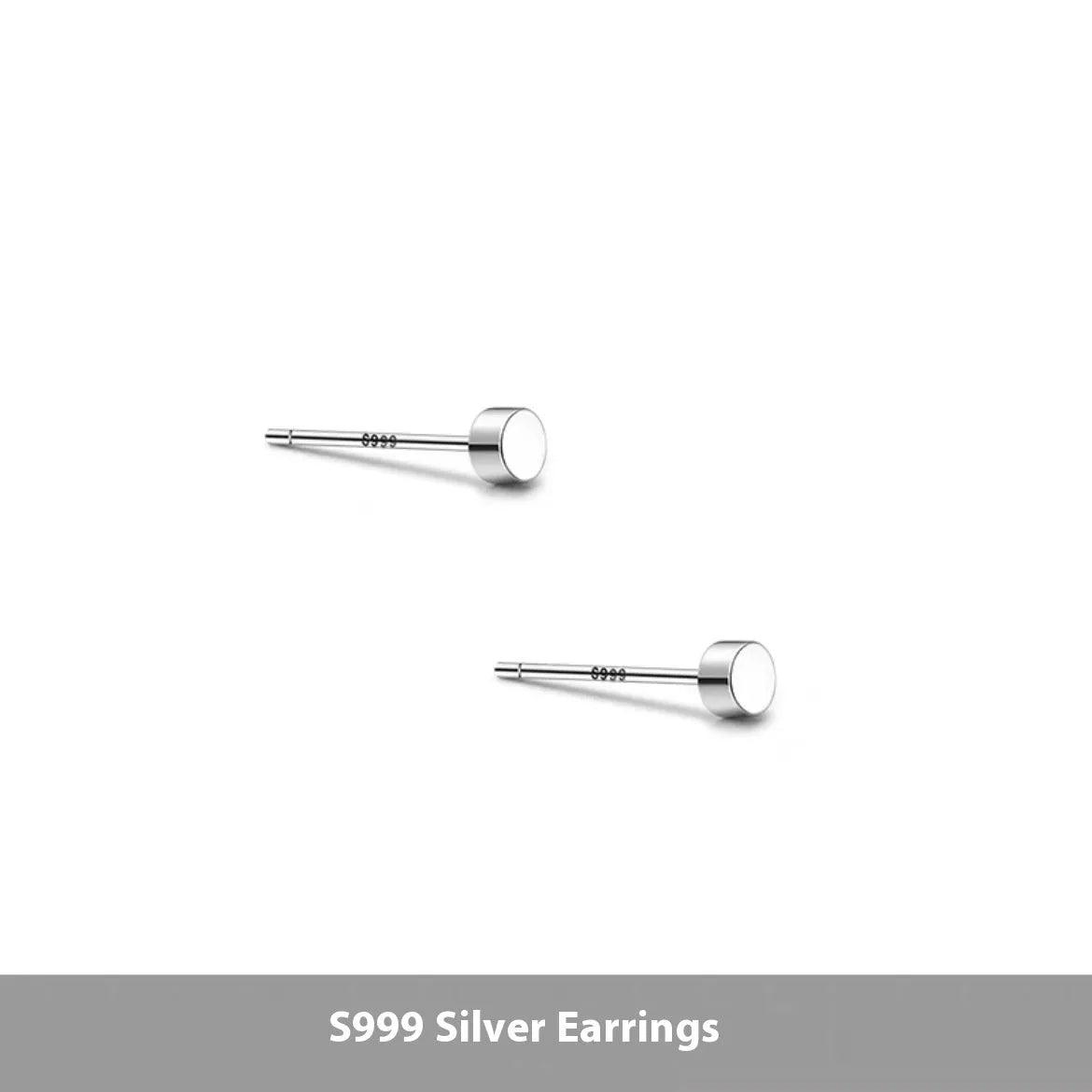 A pair of simple, round, flat-fronted S999 sterling silver ear bone studs on a plain background.