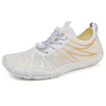 Low-top unisex casual sports running shoe in multiple colours with a lace-up front and rubber sole.