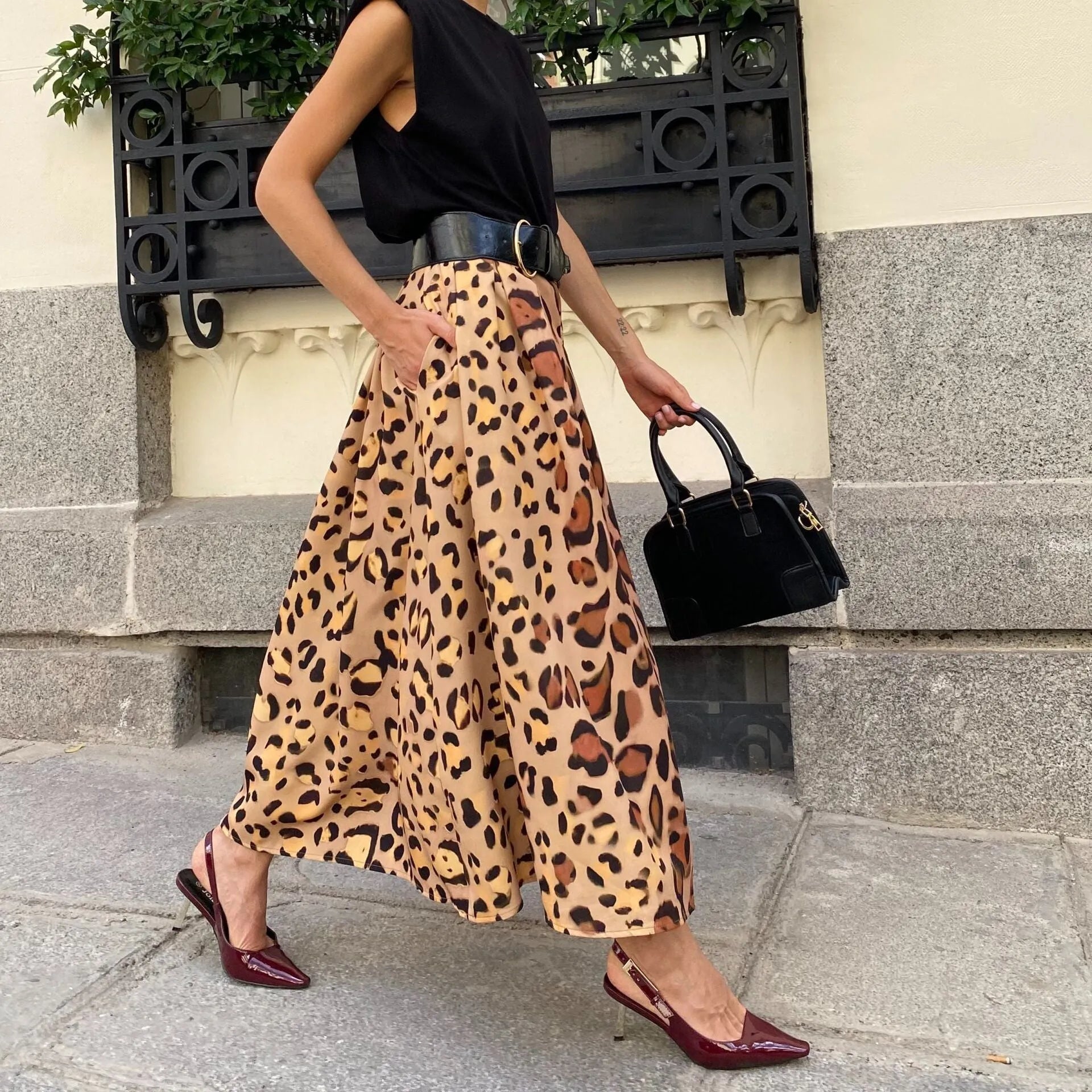 Brown leopard print women's A-line long skirt with big hem and non-stretch polyester fabric