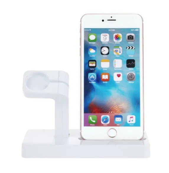 White charging dock station holding iPhone and Apple Watch for simultaneous desktop charging