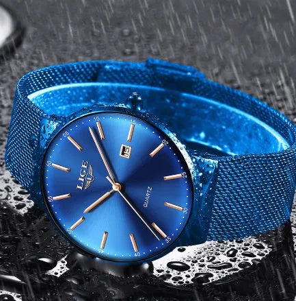 Men's stainless steel watch with a 40mm case shown in black, blue, and two-tone colour options.