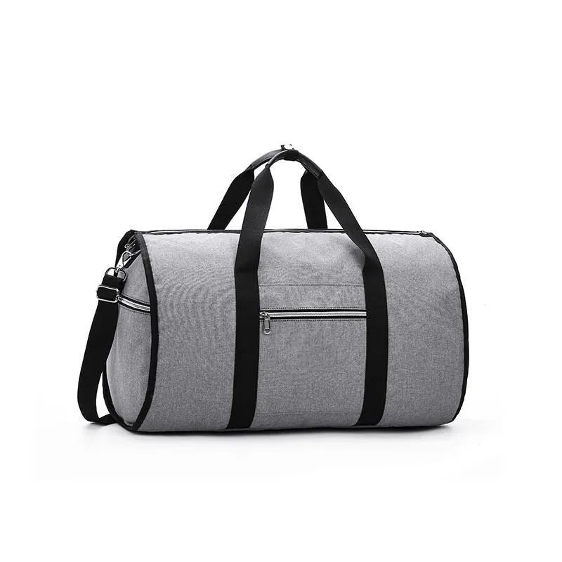 Medium-sized cylindrical travel bag in Oxford cloth, shown in one of four colours: black, blue, light grey, or red.