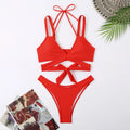 Women's solid colour bikini swimsuit with adjustable straps in briefs style.