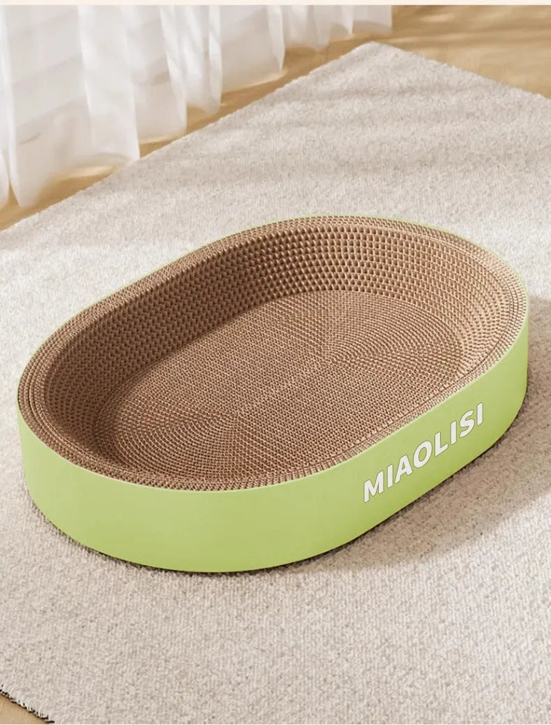 Green oval corrugated paper cat scratch board nest with a 55 cm diameter.
