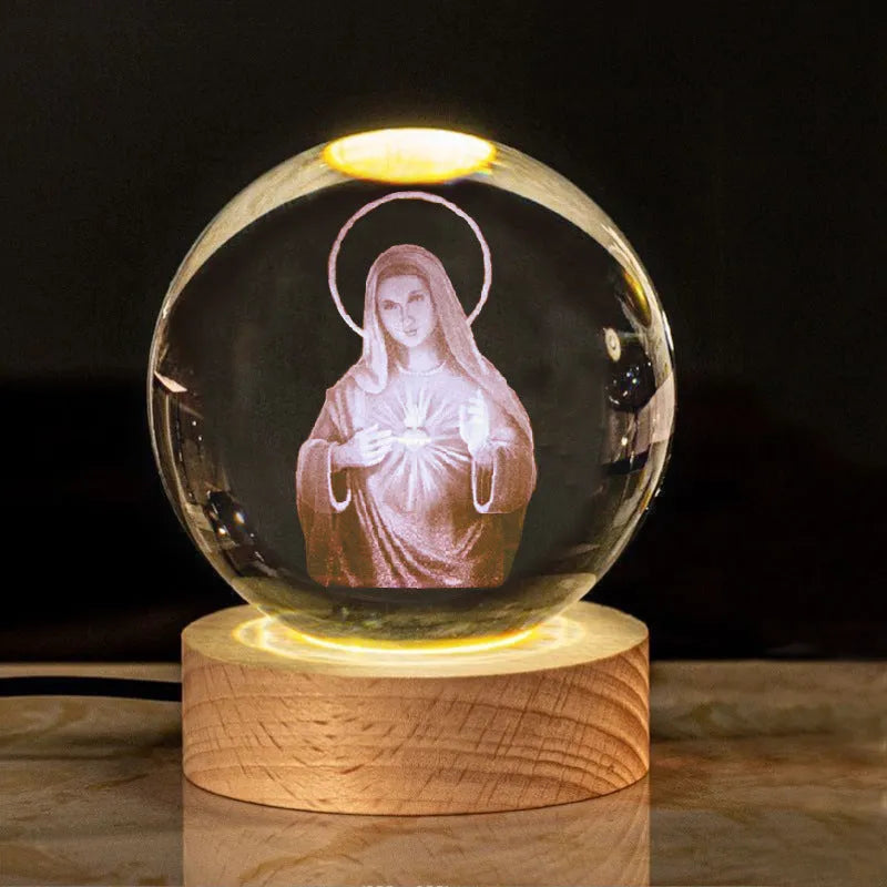 White crystal lamp with 6cm diameter orb on solid wood warm light base showing religious ornamentation
