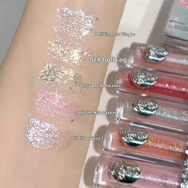 Ballet brand liquid glitter eye shadow tube shown in one of five colours: Starry Sakura Field, Doll Logs, Butterfly Paradise, Nutcracker, or Pillow Fairy Tales.