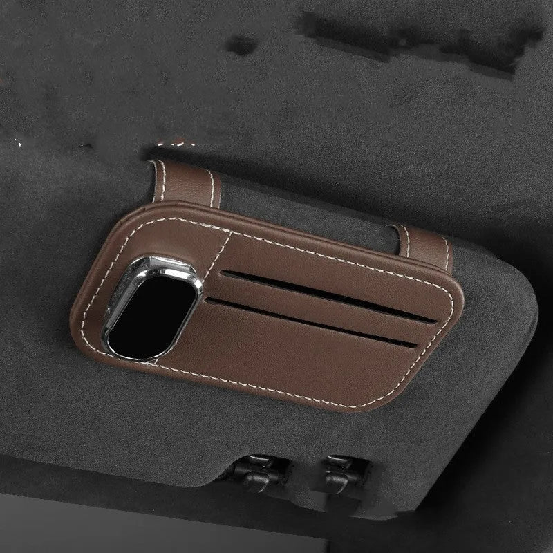Leather car sun visor card holder with sunglasses clip in snap-on design available in multiple colours.