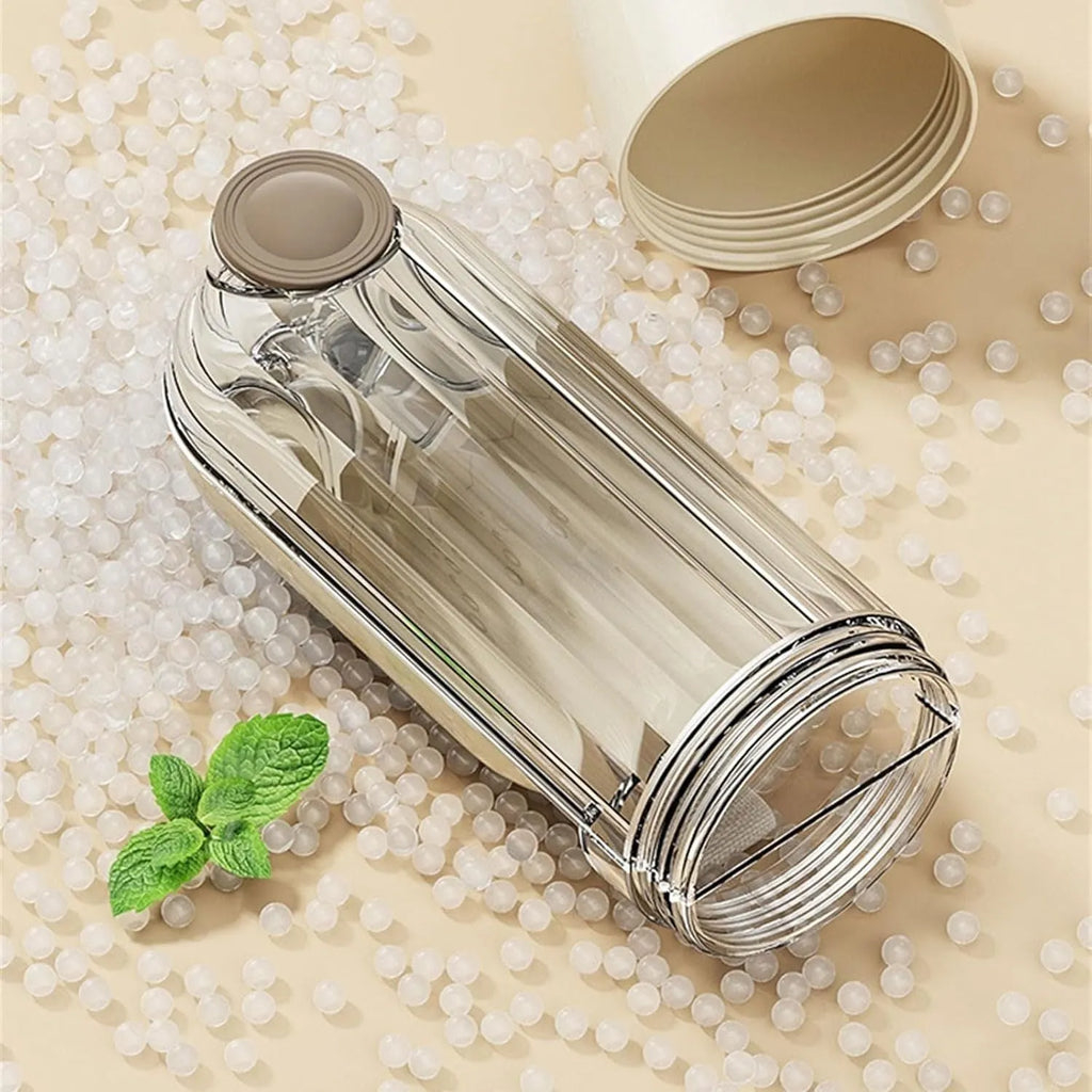 Beige foldable dog water bottle and food dispenser with tray, shown next to a dog on a walk.