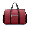 Medium-sized cylindrical travel bag in Oxford cloth, shown in one of four colours: black, blue, light grey, or red.