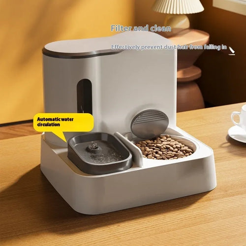 Grey automatic cat feeder and water dispenser double bowl unit on floor