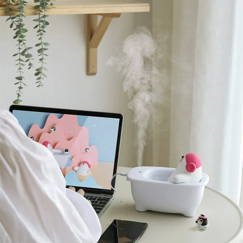 White USB air humidifier and scent diffuser with 550ml tank on a desk