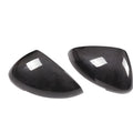 True carbon fibre rearview mirror cover for Porsche Macan, showing black woven pattern.